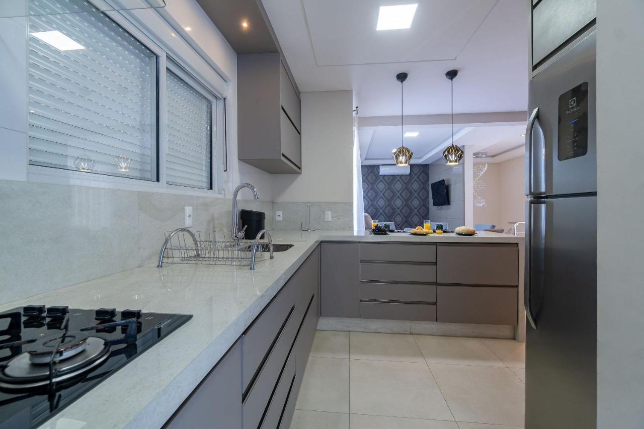 Ampla Cobertura Duplex Em Condominio Com Piscina Бомбиньяс Экстерьер фото